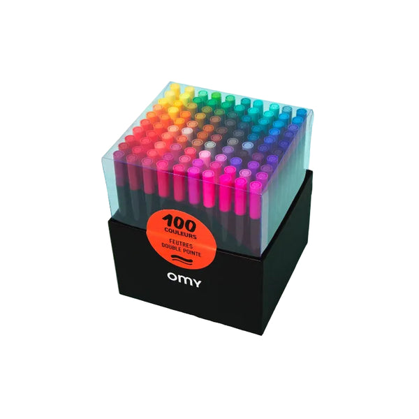 Set of 100 colorful markers in a clear holder with 'omy' branding on a light blue background