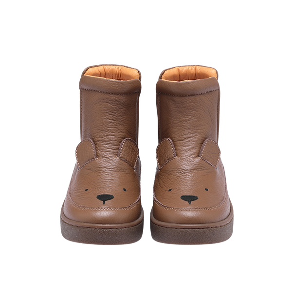 A pair of brown leather ankle boots with a bear face design on the toe area.