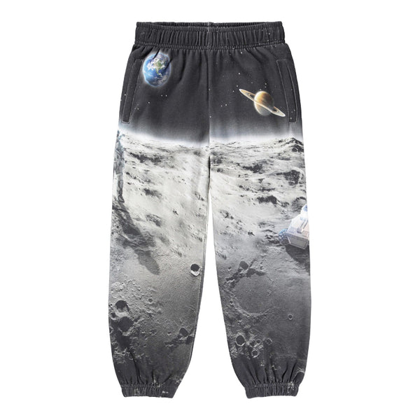 Space-themed sweatpants with moon landscape design on a white background