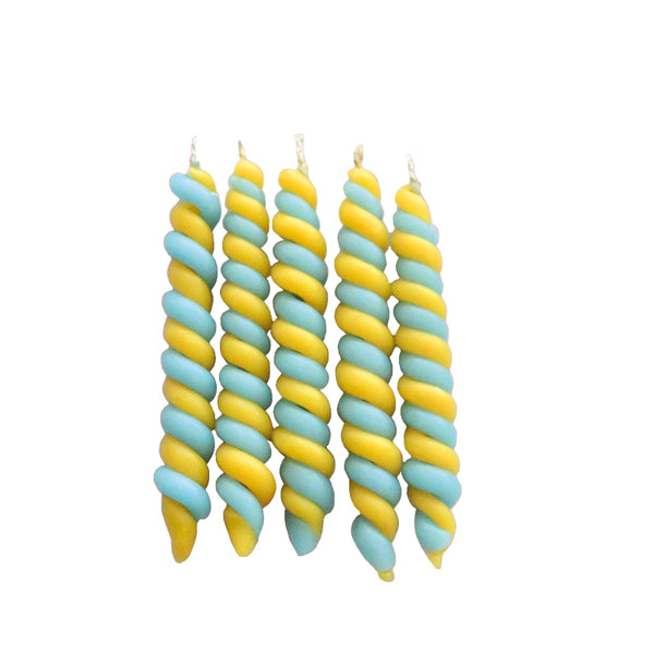 spiral-shaped candles in blue and yellow