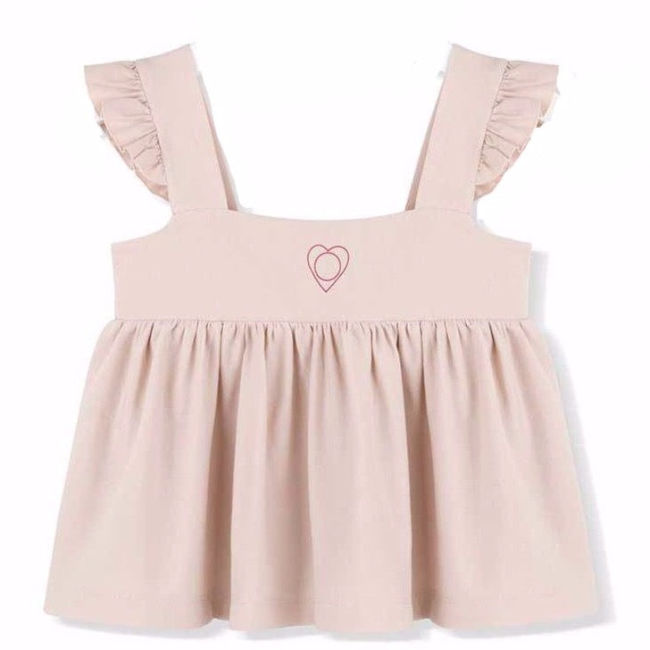 kids on the moon afterglow ruffle strap top in pink with heart chest print is loose fitting with ruffle strap detail. european kids clothes available at kodomo boston, fast shipping.