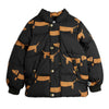 A black puffer jacket with an all-over tan dachshund dog print, featuring a snap-button front, ribbed cuffs, and a hood, 