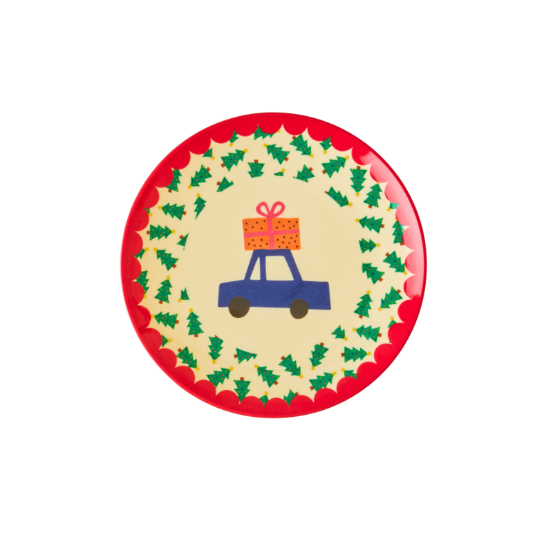 Round plate with a festive design of a blue car carrying a gift, surrounded by green trees on a red border.