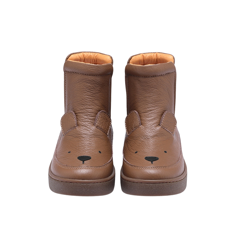 A pair of brown leather ankle boots with a bear face design on the toe area.