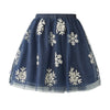 A navy blue tulle skirt with white embroidered snowflakes, featuring an elastic waistband and a layered tulle hem.