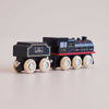 Wooden toy train engine with black and red 