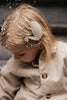 donsje swan hair clip off-white metallic