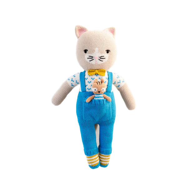 Knitted cat toy with blue overalls and a bow tie 