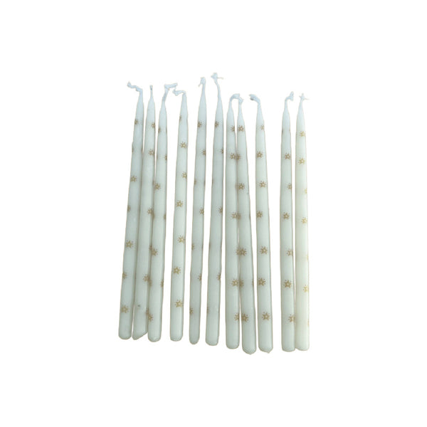 Set of white candles with gold dots 