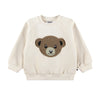 Beige sweatshirt with a bear face patch 