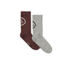 Two socks, one brown and one gray, with smiley face designs 