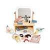 Wooden toy hair salon set with mirror, chairs, and various tools 