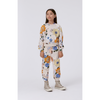 young girl modeling the molo adan sweatpants in light retro