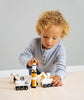 Set of toy space vehicles including a rocket, rover, and satellite 