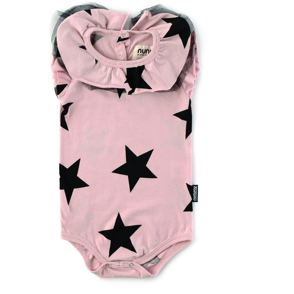 nununu sleeveless powder pink all over star print baby onesie with neck ruffle. triple snaps at the crotch guarantee easy changing. 100% cotton baby and kids clothing available at kodomo boston.