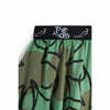 detail closeup of wolf & rita joana shorts retro flowers green