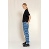 finger in the nose ollibis checkered blue jeans