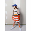 child modeling wolf & rita joana shorts in orange stripes wide stance
